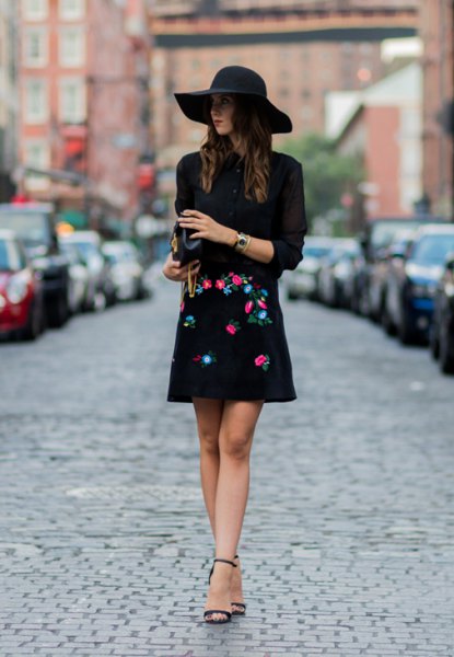black sweater floppy hat embroidered skirt