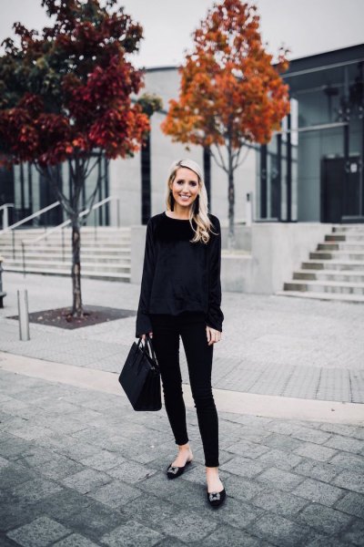 black sweater with skinny jeans and ribbons