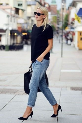 black t-shirt with blue cut, loose fitting jeans