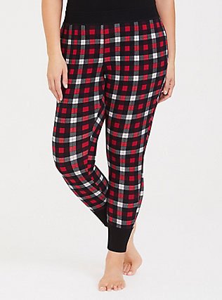 black tank top with red and white checked pajama pants with tapered legs