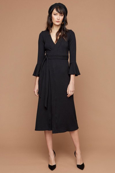 black midi wrap dress with three-quarter bell sleeves