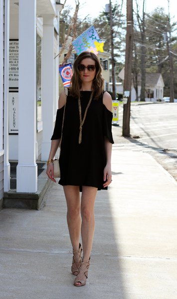 black three-quarter sleeve mini dress with cold shoulder