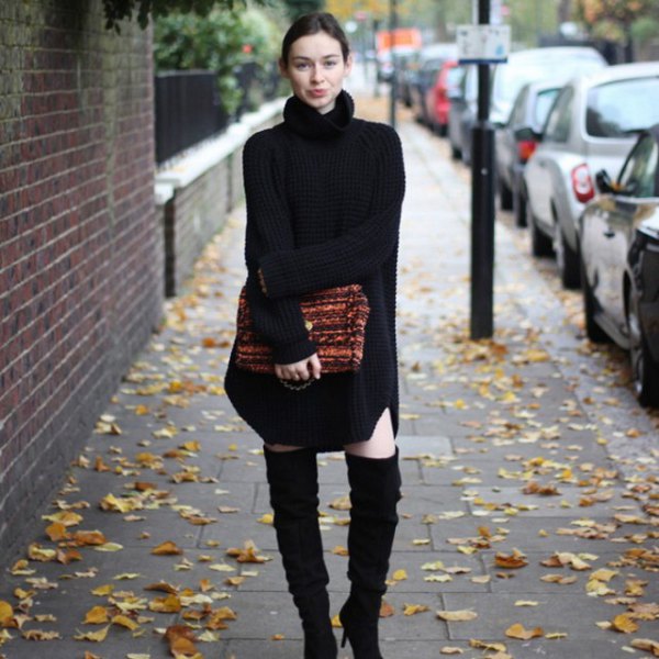 black turtleneck sweater dress with over-the-knee boots made of suede