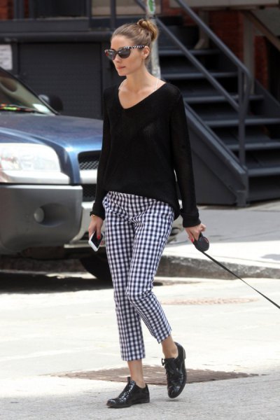 black comfortable sweater with V-neck and checked pants