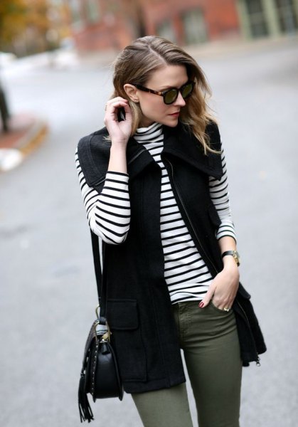 black waistcoat with striped long-sleeved T-shirt and gray skinny jeans