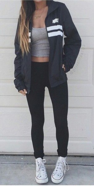 black windbreaker with gray, figure-hugging tank top with cuffed jeans