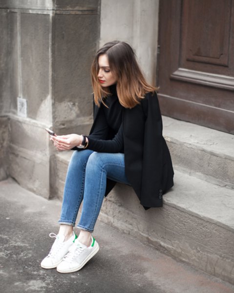 black wool coat with mock neck sweater and ankle mom jeans