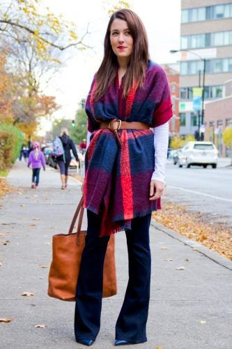 blue and orange pashmina blanket scarf with belt, black blouse and flared jeans
