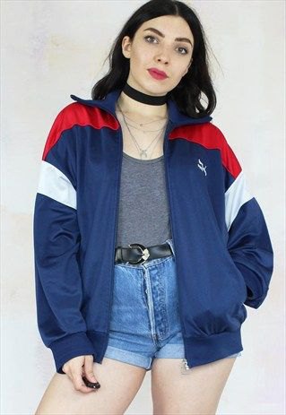 blue and red vintage windbreaker with high waisted denim shorts