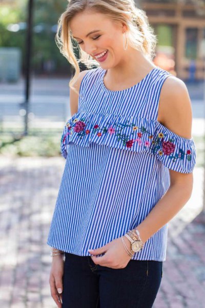blue and white striped blouse with floral embroidery and cold shoulder