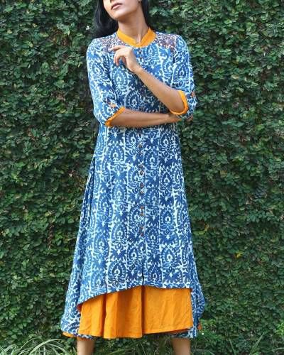 long tunic top with blue and white tribal print and mustard yellow dress