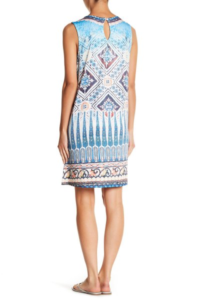 Sleeveless tunic dress with tribal print in blue and white with slide sandals