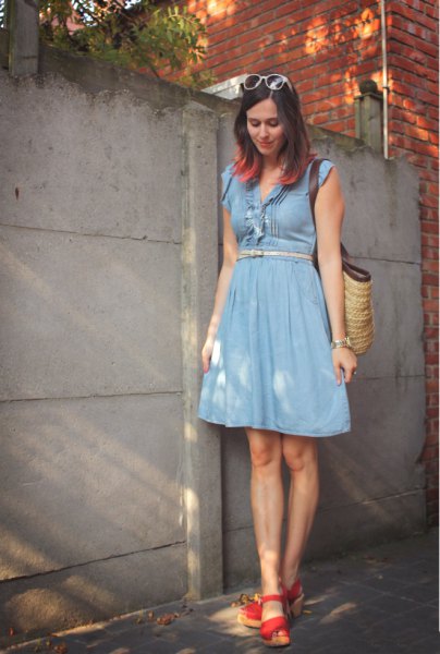 blue dress with belt and flared knee-length dress with red heels