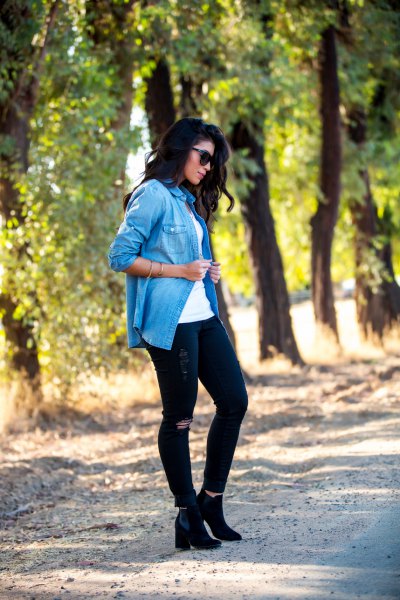 blue casual blouse with black jeans and high-heeled boots