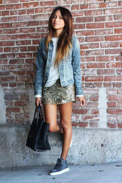 blue denim jacket with gold mini skirt and high canvas shoes
