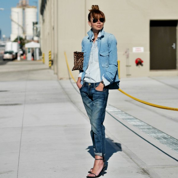 Blue denim jacket with a light chambray shirt with buttons and straight leg jeans with cuffs