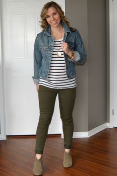 blue denim jacket with striped T-shirt and olive-green drainpipe trousers
