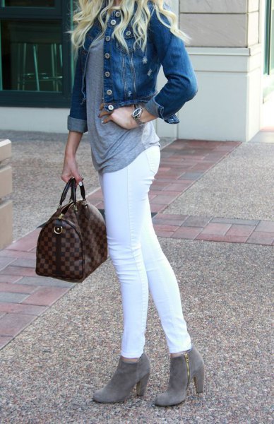 blue denim jacket with white skinny jeans and gray ankle boots