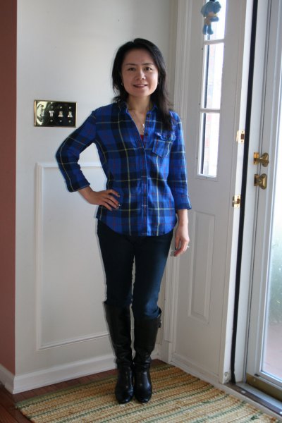 blue plaid shirt with dark skinny jeans and knee-high boots