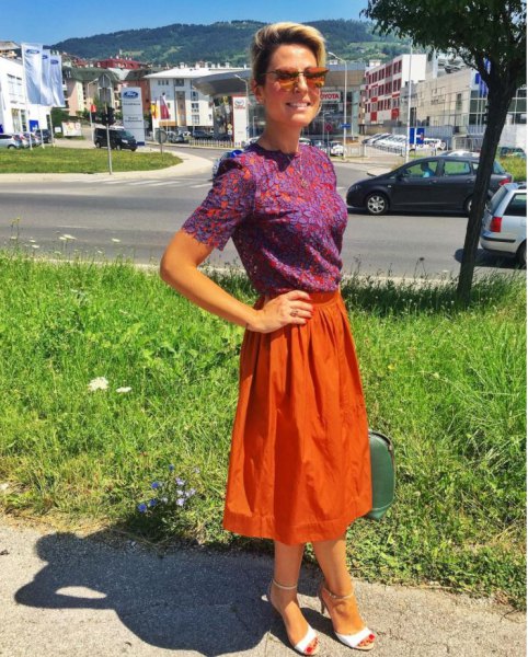 blue printed short sleeve blouse with orange midi skirt