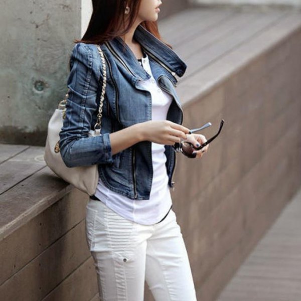 blue denim jacket with puffed shoulders and white moto jeans