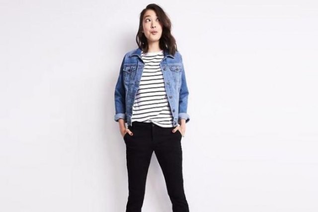 blue denim jacket with relaxed fit and black and white striped t-shirt