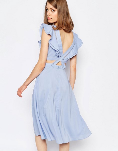 blue two-piece dress with ruffle sleeves and low back