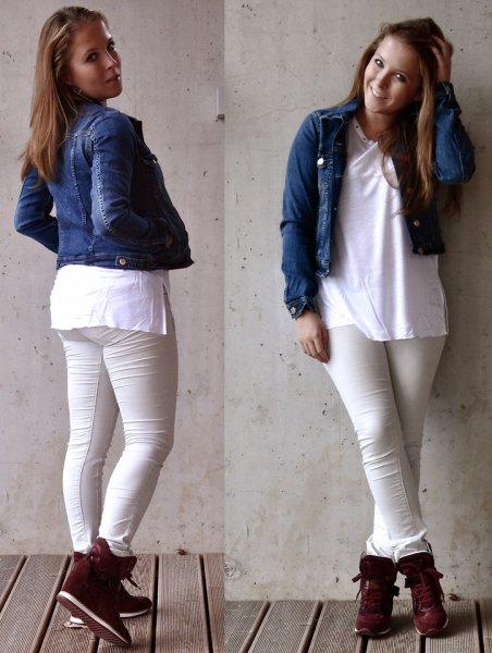 blue, cropped denim jacket with white tunic top and black sneakers with hidden wedges