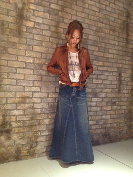 blue, slightly flared maxi denim skirt with brown leather jacket