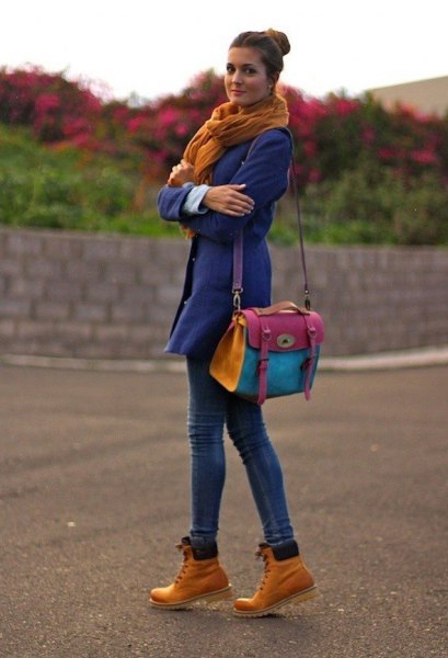 blue trench coat green scarf woodland