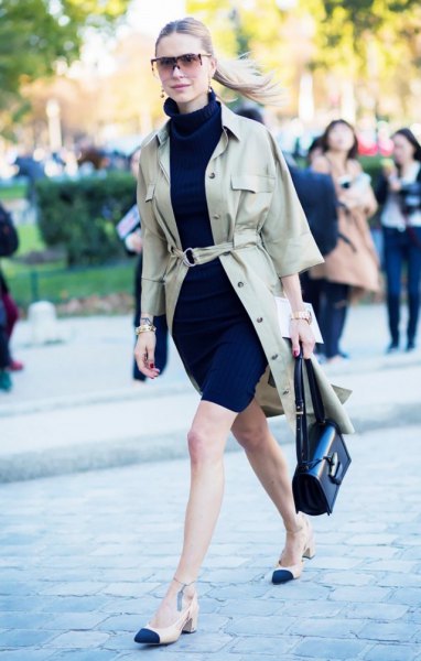 Blushing khaki jacket with belt, black mini dress with stand-up collar and low heels