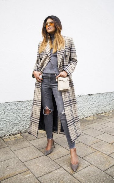 Blushing pink and black maxi checked coat with gray, torn knee jeans