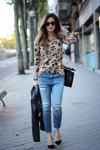 Blush pink and black printed sweaters with jeans and suede heels