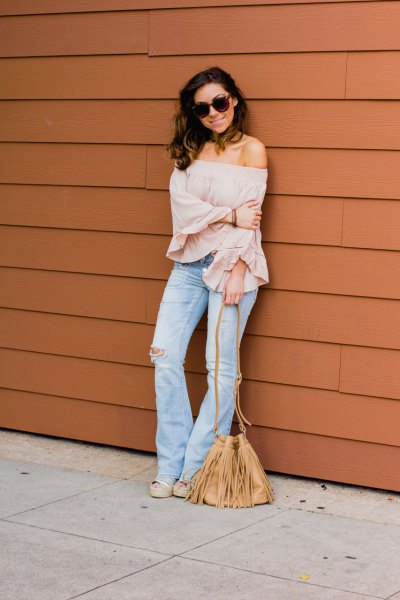 blush pink strapless blouse flared jeans