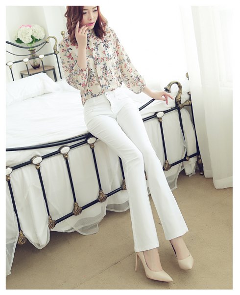 blush pink printed button up shirt with white jeans
