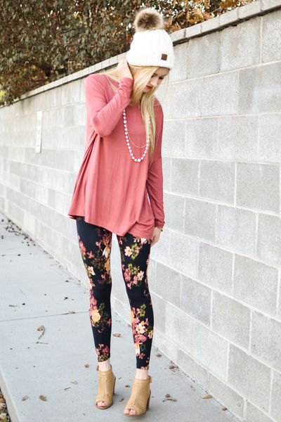 Blush pink t-shirt with floral patterned leggings and open toe boots