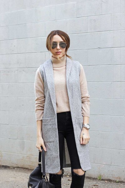 Blushing pink turtleneck with a gray longline vest