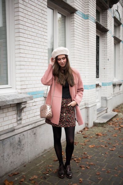 Blushing pink wool coat with black and white printed mini skirt