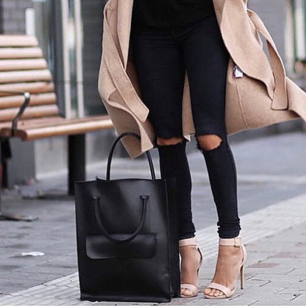 Blushing pink wool coat with black, ripped knee jeans