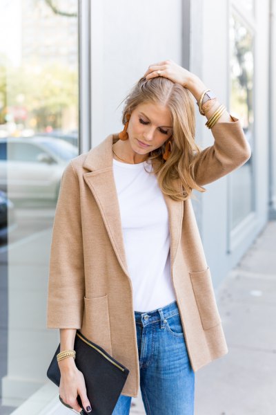 blush pink wool sweater blazer with white t-shirt and blue slim fit jeans
