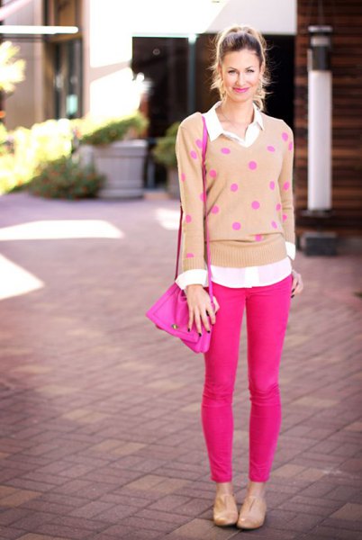 Blushing polka dot sweater with neon pink skinny jeans