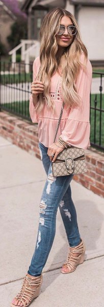 Blushing crochet blouse with puff sleeves, ripped jeans and strappy heels