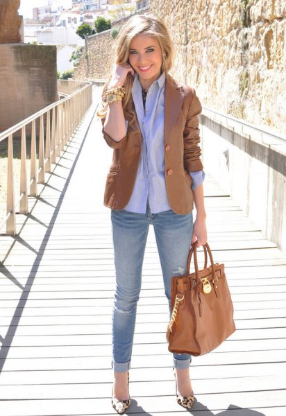 brown blazer with light blue shirt with buttons and jeans with cuffs