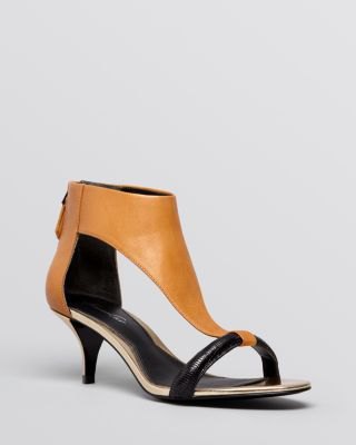 brown leather sandals with kitten heel, black mini fit and flared dress