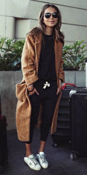 brown maxi wool travel blazer with black sweatshirt and short jeans