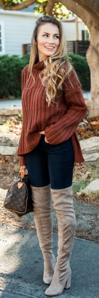 brown ribbed sweater with stand-up collar and gray, thigh-high boots