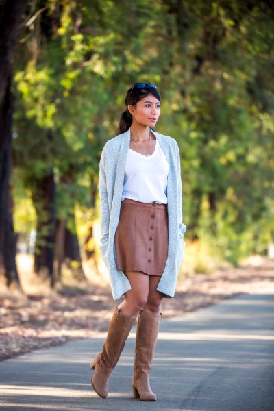 brown suede knee high boots with matching leather skirt
