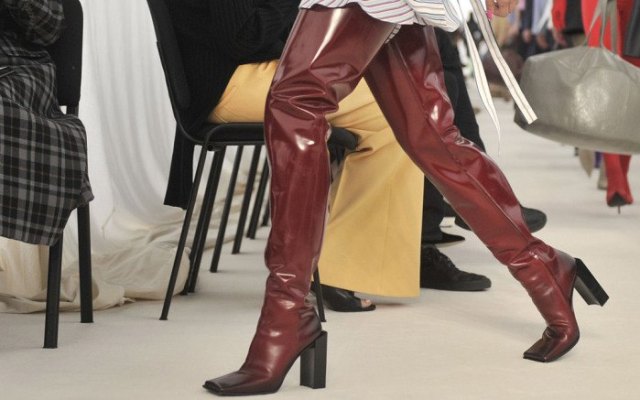brown, thigh-high, shiny, square toe boots made of leather with a striped shirt dress