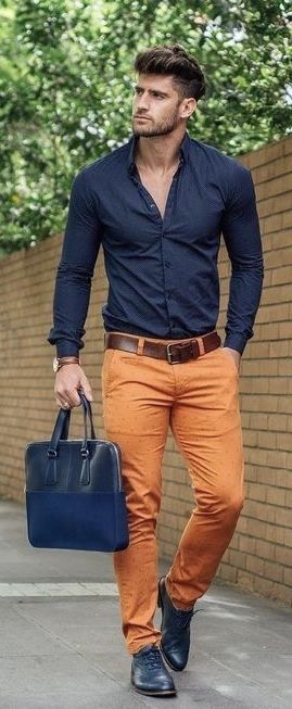 Summer business casual outfit idea with a navy button up shirt .