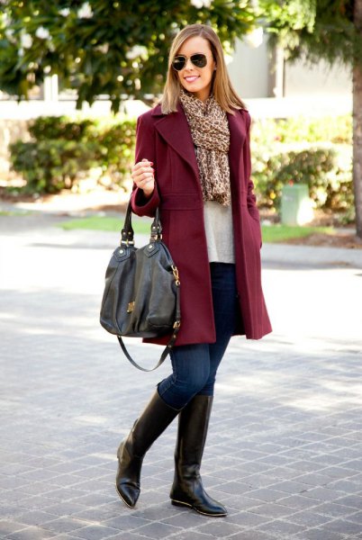 Burgundy coat with leopard print scarf and knee-high boots
